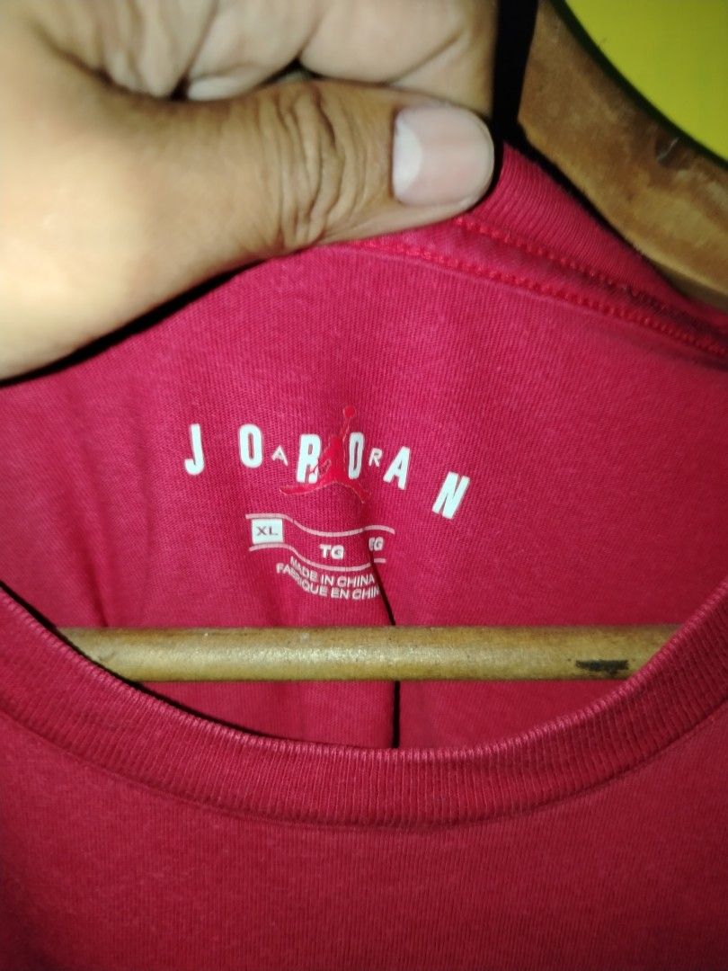 Jordan Red T-Shirt Size XL (Category: Tshirts & Polo Shirts ) located in Caloocan City. Submitted by vincefresn21903 (Listing ID 1469668233, Image 2). Description: - Brand: Jordan - Color: Red - Size: XL - Design: Jumpman logo and letter branding on the chest - Details: Short sleeves, crew neck - Authenticity: Style code CJ9571-687 on wash tag - Origin: Made in China.