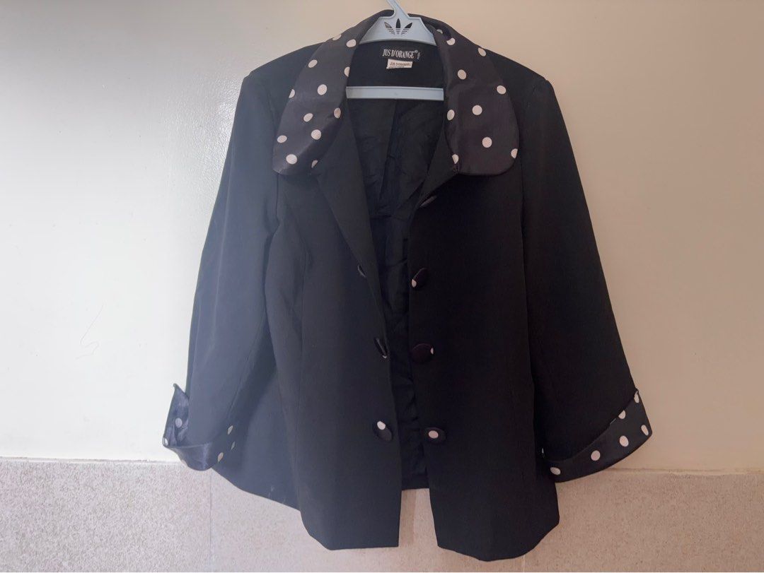 Jus D'Orange Black Blazer with Polka Dot Collar (Category: Coats, Jackets and Outerwear) located in Antipolo. Submitted by faithforgotten (Listing ID 1469623114, Image 1). Description: - Brand: Jus D'Orange - Color/Pattern: Classic black with contrasting white polka dots on collar, cuffs, and buttons - Cut: Mid-length outerwear - Features: Classic dark inner lining, button-up front - Condition: Excellent - Perfect for: Cooler weather and stylish 