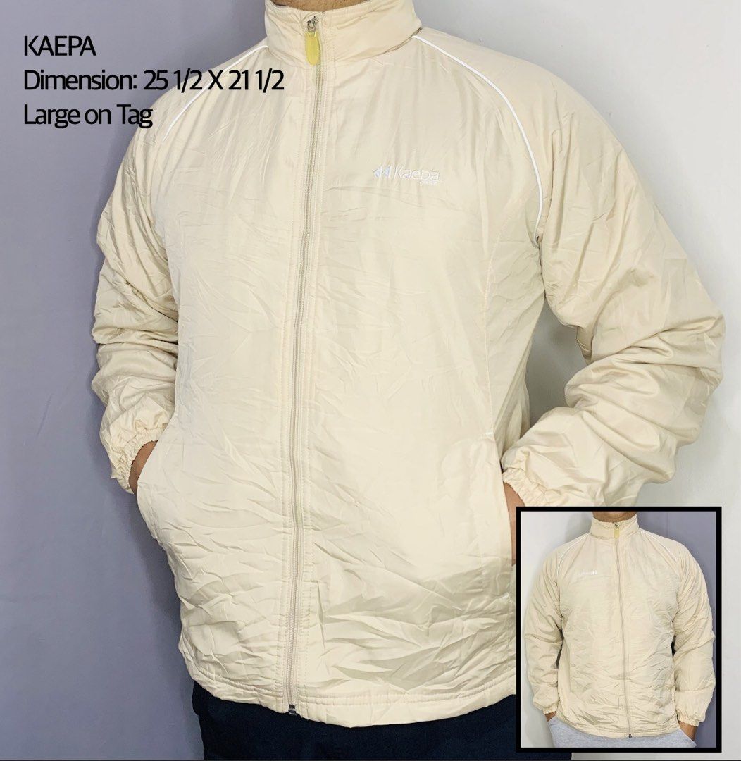 Kaepa Cream Full Zip Windbreaker Jacket Large (Category: Coats, Jackets and Outerwear) located in Taguig. Submitted by citytrendsph (Listing ID 1469660030, Image 1). Description: - Brand: Kaepa - Color: Cream with white piping and logo embroidery - Size: Large (Measurements: 25.5" L x 21.5" W) - Design: Full zip front, high neck collar - Features: Elastic cuffs and hem for wind protection - Condition: Excellent vintage/pre-loved condition.