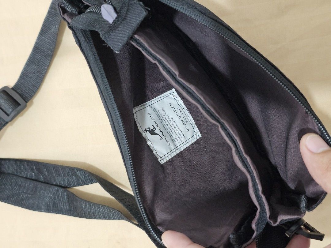 KANGOL Black Crossbody / Sling Bag (Category: Sling Bags) located in Las Pinas. Submitted by 3xplor3r (Listing ID 1469595218, Image 3). Description: KANGOL Black Crossbody / Sling Bag • Price: ₱150 • Condition: Excellent preloved / No issue • Compact, multi-pocket, and lightweight—perfect for everyday travel & errands! Location: Las Piñas, Parañaque or Pasay.