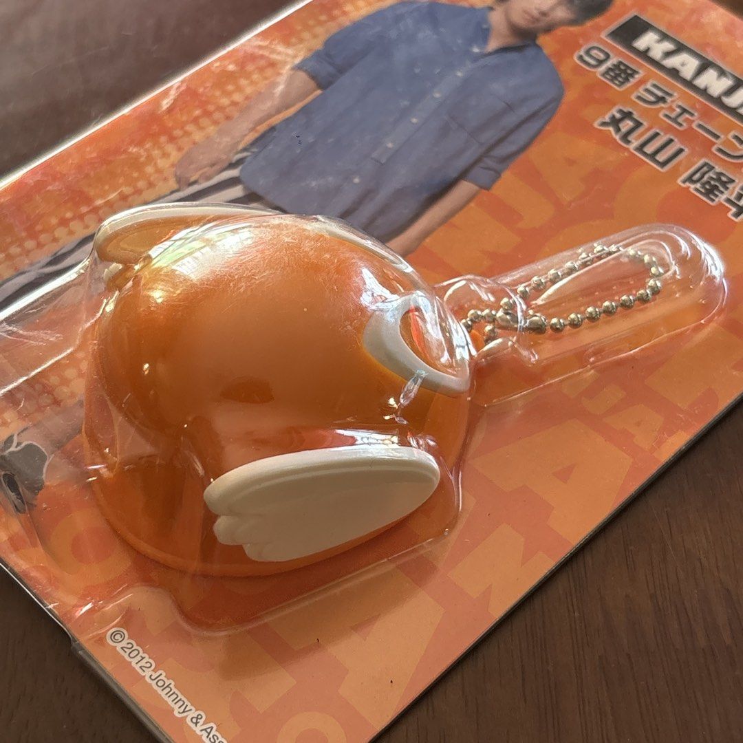 Kanjani8 Ryuhei Maruyama Chain Light Keychain Goods 2012 (Category: Character Goods) located in Manila. Submitted by aobacafe (Listing ID 1469678584, Image 2). Description: - Official Johnny & Associates Kanjani8 merchandise - Features Ryuhei Maruyama (Member color: Orange) - Item No. 9: Chain light keychain with miniature helmet design - Released in 2012 - Condition: Brand new, unopened, and kept securely in storage - Rare collector's item, perf
