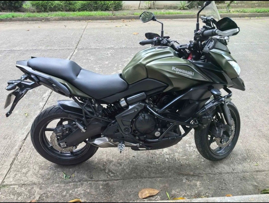 KAWASAKI VERSYS 650 2018 (Category: Motorbikes for Sale) located in Paranaque City. Submitted by abbbi17674 (Listing ID 1469695003, Image 2). Description: 2018 Kawasaki Versys 650 Ready for long rides 25k milage Crash bars Radiator Guard LED lights TDD Night Ranger Aux Lights Barkbusters handguards SW Motech Bashplate SW Motech Side Stand Foot Extension EBC brake pads Motul Brake Fluid Motul Coolant DID 520VX3 Gold X-Ring Chain YUASA YTX14-BS Pir