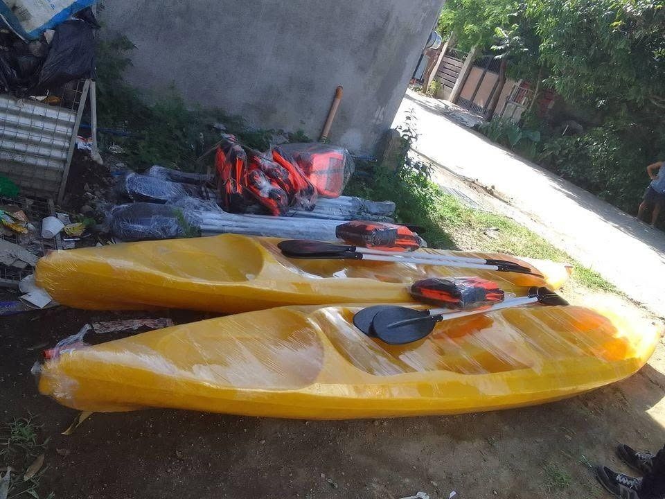 KAYAK BOAT (Category: Water Sports) located in Caloocan City. Submitted by calmhawk_a2cd7a (Listing ID 1469577861, Image 2). Description: • STINGRAY 2 SEATER KAYAK BOAT • WITH 2 PADDLE & 2 LIFE VEST TYPE: Sit-On Tandem Seat (Max. Speed = 3.5 knots) APPLICATION: Rivers, Lakes, Light Ocean Swells MATERIALS: 100% Virgin Linear Density Polyethylene with UV Stabilizers DIMENSIONS: L x W (14’ x 30”) WEIGHT : 81 lbs. CAPACITY: 400 – 420 lbs. (Depending 