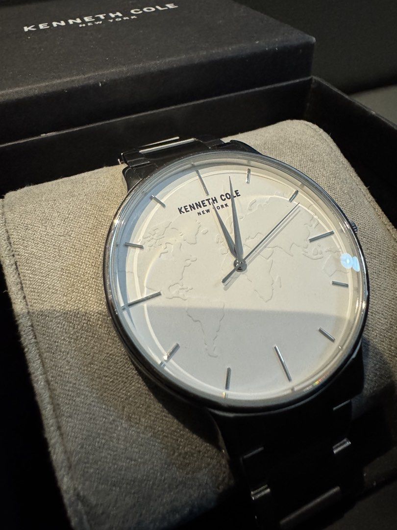 Kenneth Cole New York World Map Dial Edition (Category: Men's Watches) located in Las Pinas. Submitted by whiskyking04907 (Listing ID 1469721757, Image 3). Description: Display Type: Analog Dial Color: Silver Movement: Quartz Case Material: Stainless Steel Case Diameter: ~40 mm Case Thickness: ~8 mm Band Material: Stainless Steel Water Resistance: 30 meters (3 ATM / 100 feet) Crystal: Protected by standard scratch-resistant mineral glass. Style P