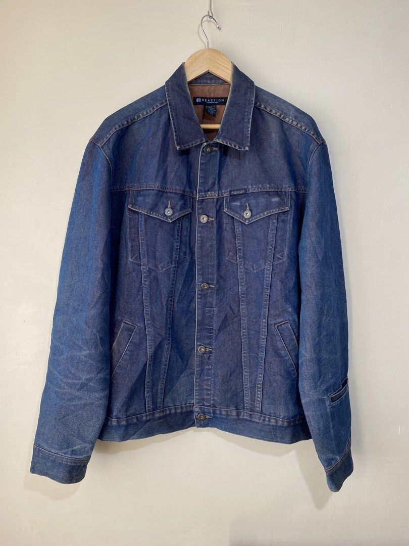 KENNETH COLE,Dark-wash denim jacket (Category: Coats, Jackets and Outerwear) located in Cavite. Submitted by jc_thrift95 (Listing ID 1469660718, Image 1). Description: - a dark-wash blue denim trucker jacket featuring a point collar, dual chest flap pockets with button closures, lower welt pockets, and a button-front placket. - Made in Hongkong - L- 28 inch - W- 25 inch - Color rate 8/10 - See picture details for dimes..