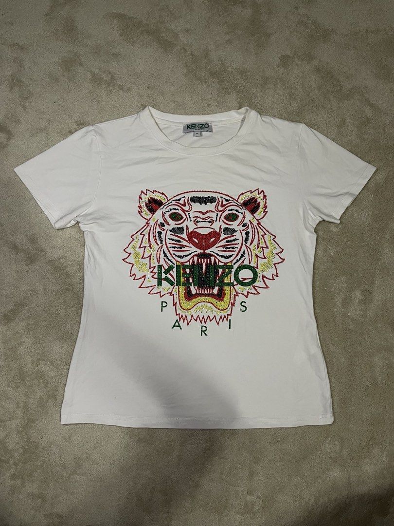 Kenzo Tiger Head Motif (Category: Luxury Apparel) located in Bacoor. Submitted by southhustlaaaaa (Listing ID 1469621523, Image 1). Description: Kenzo Tiger Head Motif authentic size: xl on tag length: 23 inches width: 18 inches issue:none❌ excellent condition.