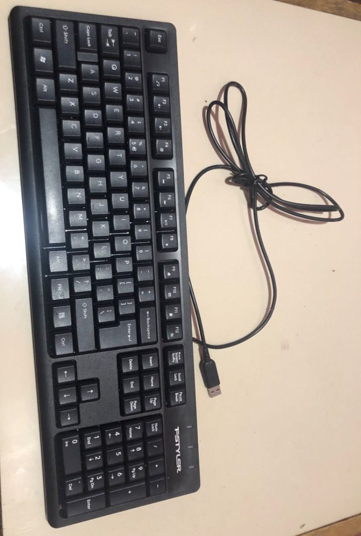 Keyboard PSYLER (Category: Computer Keyboard) located in Caloocan City. Submitted by grandrabbit_37a789 (Listing ID 1469744791, Image 1). Description: Preloved PSYLER Wired USB Keyboard with Numeric Keypad Selling a preloved PSYLER wired USB keyboard in black. Features a full-size keyboard layout with a dedicated numeric keypad, function keys, arrow keys, and multimedia shortcuts. Easy to connect via USB—just plug it into a compatible computer or