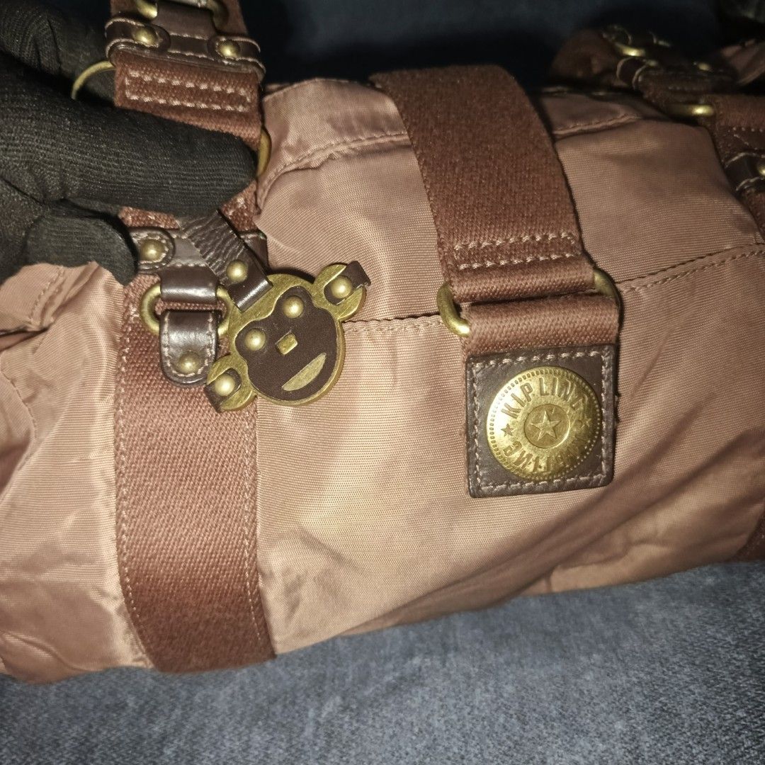 Kipling vintage shoulder bag (Category: Luxury Bags & Wallets) located in Urdaneta. Submitted by bernalyn25 (Listing ID 1469749696, Image 3). Description: - Vintage Kipling bag - Super clean interior and exterior - Has unnoticeable flaw ( see last 2 pics) - Aside from the flaw it can pass as new - Lightweight.