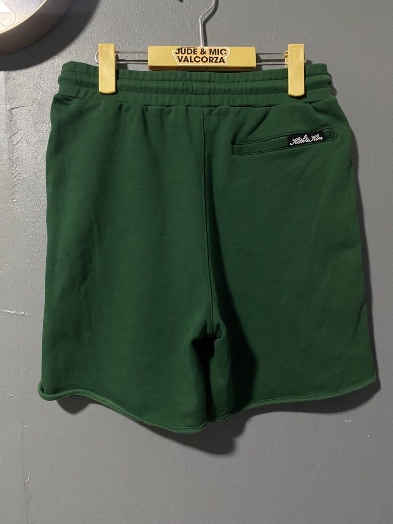 Kith & Kin Green Sweatshorts Size M (Category: Shorts) located in Tanay. Submitted by judevalcorza (Listing ID 1469706688, Image 2). Description: - Brand: Kith And Kin - Item: Green Sweatshorts - Size: Medium Waist 30/32 Length 17 - Material: 100% Cotton - Features: Elastic waistband with drawstring closure, stylish scalloped curved hem design - Details: Back pocket with 'Kith & Kin' embroidered logo patch - Condition: Excellent / As good as new.