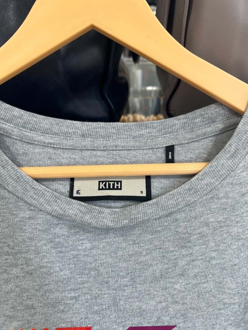 Kith Grey Gradient Logo T-Shirt Size S (Category: Tshirts & Polo Shirts ) located in Urdaneta. Submitted by jayceegarage (Listing ID 1469673645, Image 2). Description: - Brand: Kith - Color: Grey - Size: Small - Material: 100% Cotton (Self and Rib) - Design: Classic crew neck with a vibrant gradient logo graphic on the chest - Origin: Designed in NY / Assembled in China - Condition: Excellent, well-maintained - Mode of Payment: GCash, BPI, or Ban
