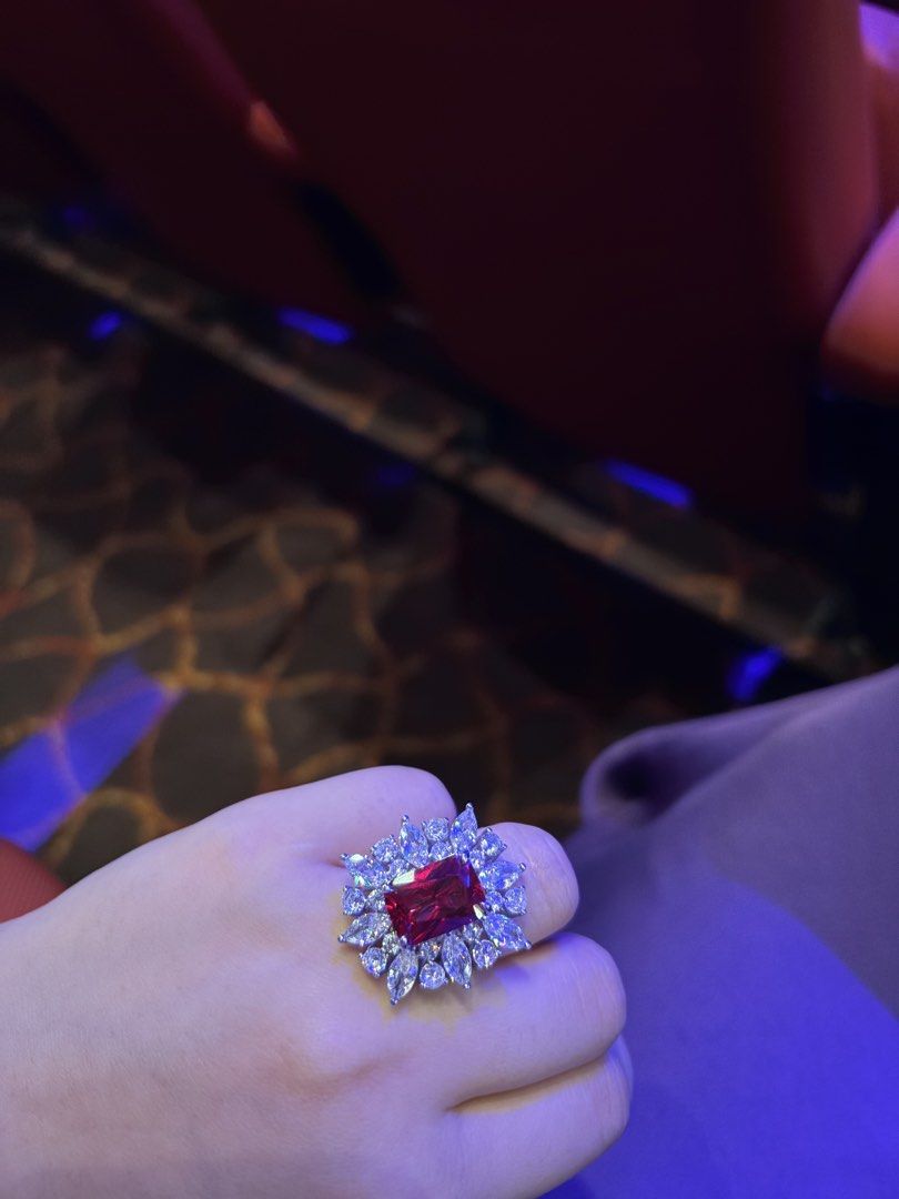 Lab/man made ruby Red Crystal Cocktail Ring with Clear Rhinestone Cluster (Category: Rings) located in Taguig. Submitted by labellearmoire2 (Listing ID 1469657326, Image 1). Description: Lab/man made ruby Red Crystal Cocktail adjustable/free size Ring that glows under UV will post the glow later in a bit this has earrings to match if you are interested only 4.9k as set and 2.9k each Pls treat them as accessories as the exact material of the ring 