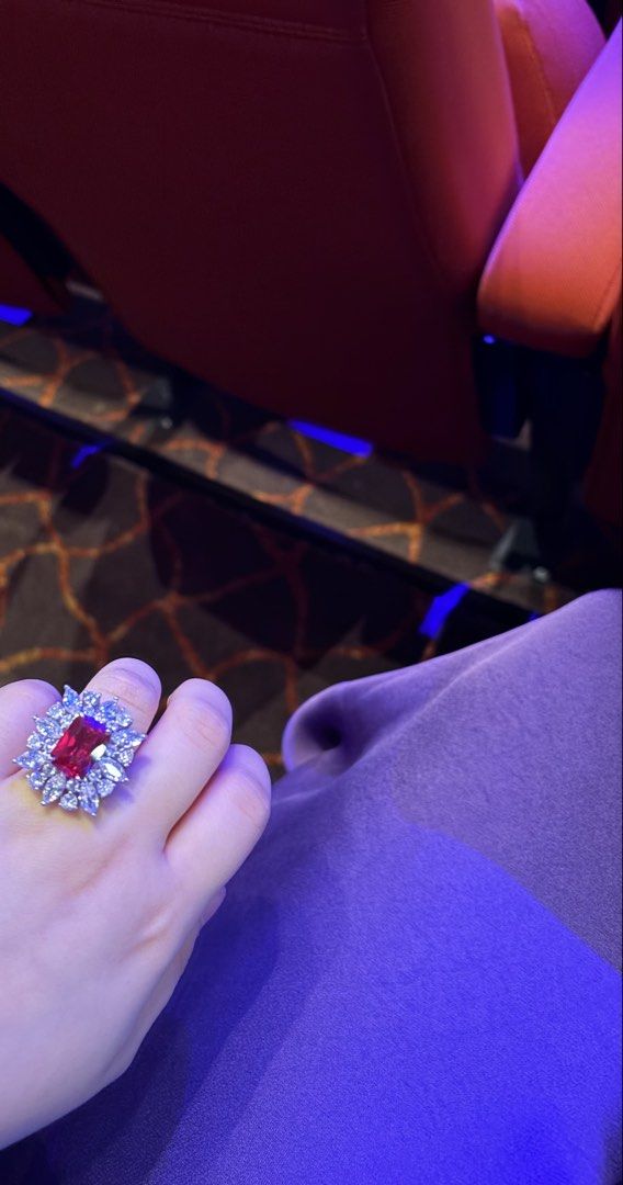 Lab/man made ruby Red Crystal Cocktail Ring with Clear Rhinestone Cluster (Category: Rings) located in Taguig. Submitted by labellearmoire2 (Listing ID 1469657326, Image 2). Description: Lab/man made ruby Red Crystal Cocktail adjustable/free size Ring that glows under UV will post the glow later in a bit this has earrings to match if you are interested only 4.9k as set and 2.9k each Pls treat them as accessories as the exact material of the ring 