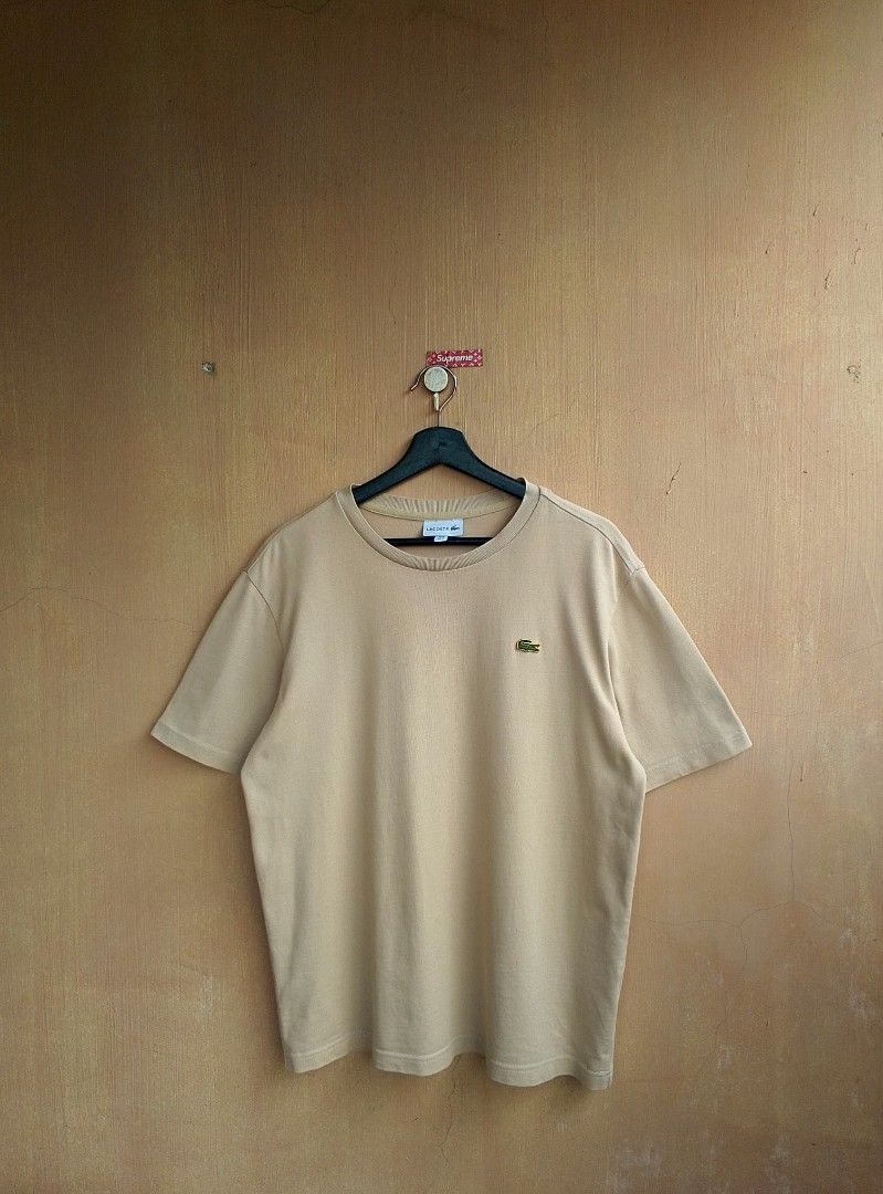 Lacoste Beige T shirt (Category: Tshirts & Polo Shirts ) located in Lipa City. Submitted by MEECHYTWO2TWO (Listing ID 1469618538, Image 3). Description: • LACOSTE BEIGE T SHIRT - Size: FR: 4 / US: M / Best fit M-L - Width:21.5 / Length: 27 - Location: Lipa City, Batangas - Excellent condition - Color rate: 9.5/10 - Additional sf +75 - Mop: GCASH/NO COD - Payment first tomorrow will be shipped.