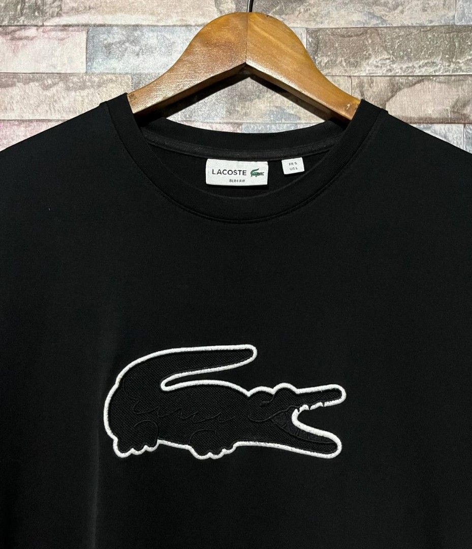LACOSTE BIG LOGO TEE (Category: Luxury Apparel) located in Caloocan City. Submitted by wewearworn (Listing ID 1469587924, Image 2). Description: Large on tag 20 x 27 Excellent No Issues 9.5/10 Color Rate.