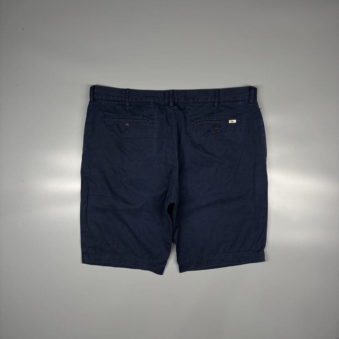 Lacoste Chino Short (Category: Shorts) located in Cavite. Submitted by onebeancent (Listing ID 1469600299, Image 3). Description: 🔘CODE 00191 Size: 38 to 41 Waistline Dimension: 21" Length Color: Navy Blue Color Rate: 9/10 Issue: None Condition: Excellent Price: 780php Additional Shipping Fee (J&T Small Pouch) 75php Luzon 100php visayas 120php mindanao.