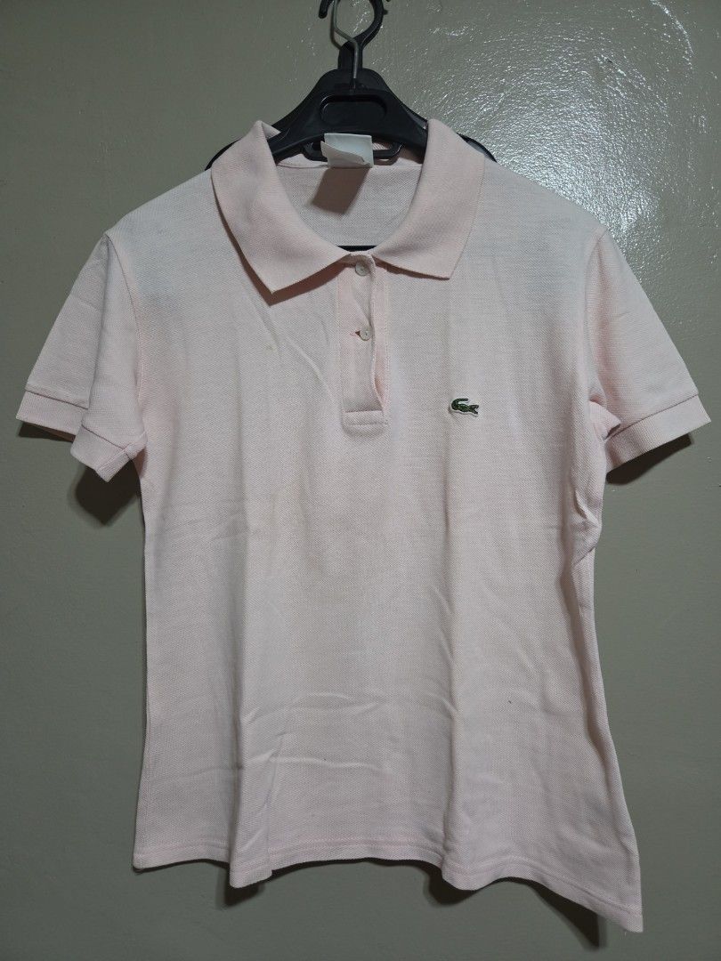 Lacoste Pink Polo Shirt Size 40 (Category: Tshirts & Polo Shirts ) located in Quezon City. Submitted by klarebear15 (Listing ID 1469729808, Image 1). Description: - Authentic Lacoste polo shirt in a versatile light pink shade - Size: Tagged size 40 - Design: Classic collar, short sleeves, and two-button placket.