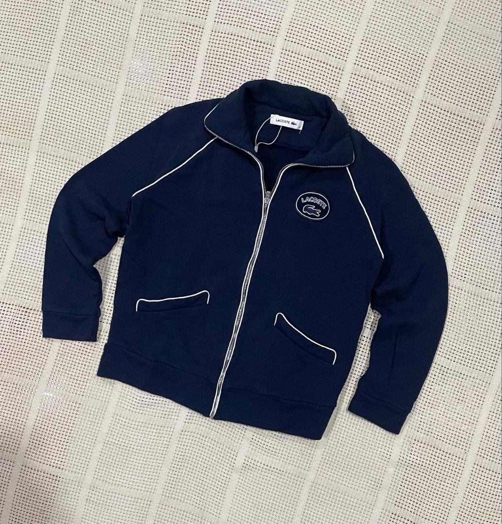 Lacoste Stand Up Collar Pipe Zippered Track Jacket (Category: Luxury Apparel) located in Bacolod City. Submitted by abkicks_apparel (Listing ID 1469727593, Image 2). Description: Lacoste Stand Up Collar Pipe Zippered Track Jacket Size 38 on Tag W19 L24 Authentic Original As New Condition No Hidden Issues .
