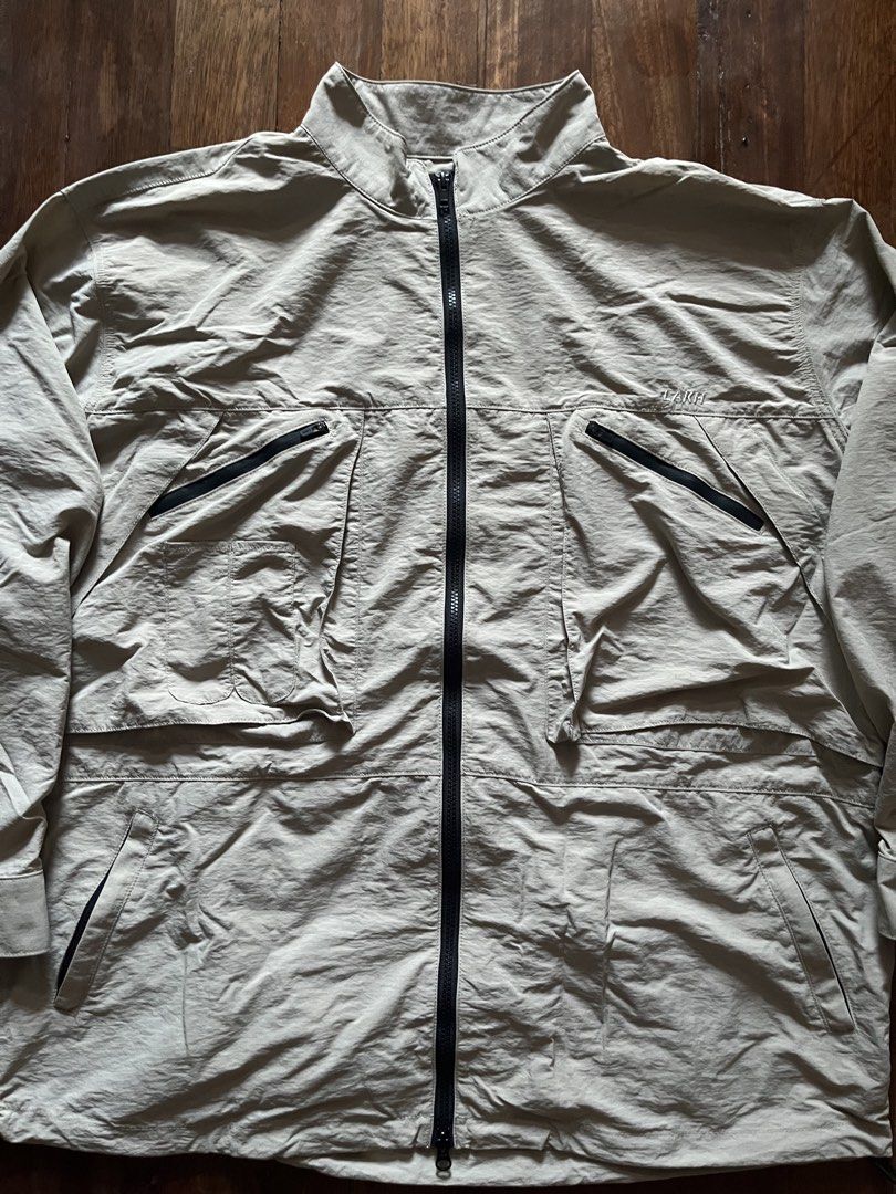 LAKH packable nylon utility jacket (convertible to bag) (Category: Coats, Jackets and Outerwear) located in Los Banos. Submitted by lootmeup (Listing ID 1469599174, Image 2). Description: LAKH packable nylon utility jacket (convertible to bag) Total of 9 pockets, really great for a utility jacket Double zip Size: Width: 27.5 Length: 30 Mine P1,500.
