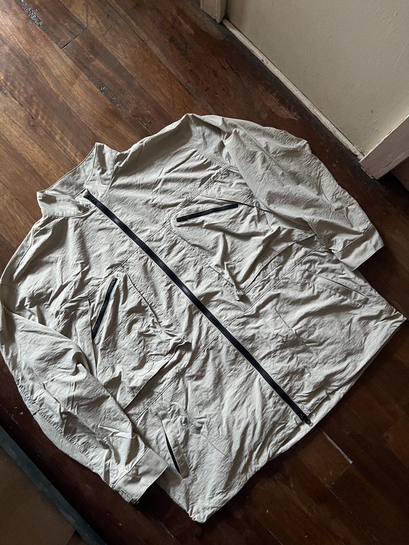 LAKH packable nylon utility jacket (convertible to bag) (Category: Coats, Jackets and Outerwear) located in Los Banos. Submitted by lootmeup (Listing ID 1469599174, Image 3). Description: LAKH packable nylon utility jacket (convertible to bag) Total of 9 pockets, really great for a utility jacket Double zip Size: Width: 27.5 Length: 30 Mine P1,500.
