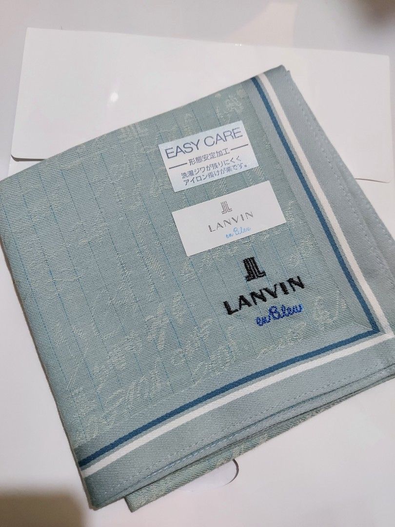 LANVIN en Bleu Green Handkerchief Pocket Square (Category: Handkerchief & Pocket Squares) located in Caloocan City. Submitted by chonadura91470 (Listing ID 1469650654, Image 1). Description: - Brand: Lanvin en Bleu - Color: Green with subtle patterned background - Condition: Brand new with tags attached - Material: Easy-care fabric - Design: Classic folded square style featuring embroidered designer logo text - Perfect for: Everyday pocket access