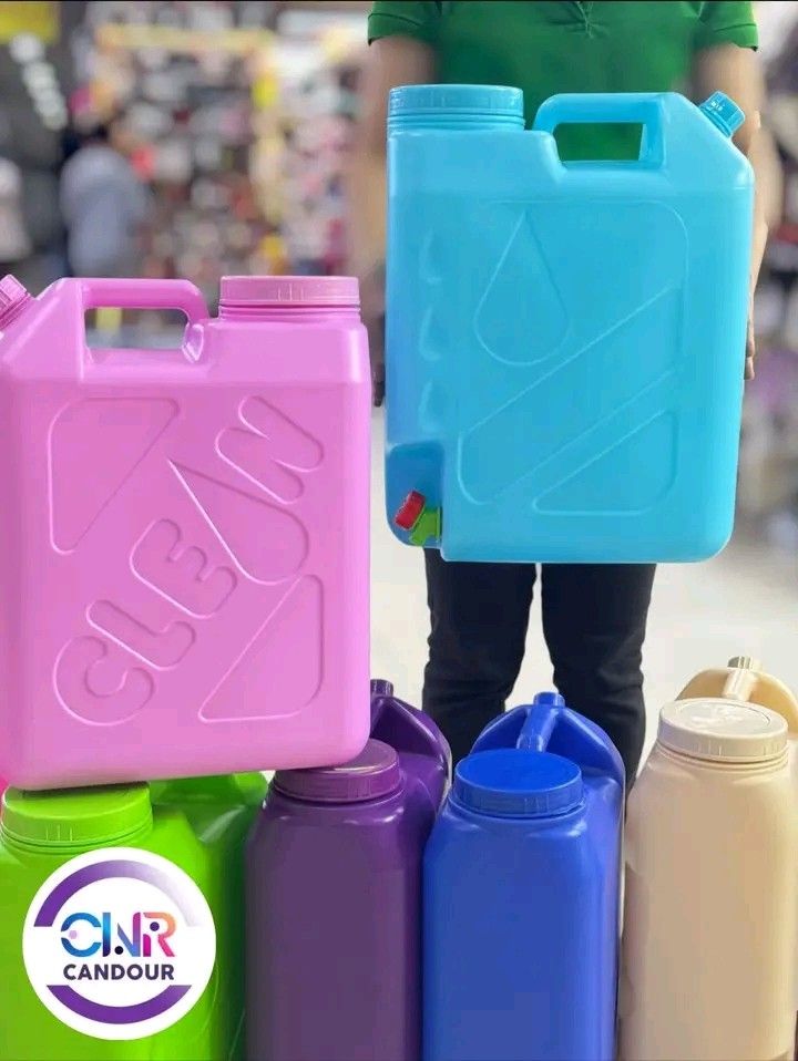 Large Plastic Water Container Jerry Can with Spigot (Category: Water Bottles & Tumblers) located in Quezon City. Submitted by marecel146 (Listing ID 1469617692, Image 1). Description: - Heavy-duty plastic water containers in vibrant colors: pink, light blue, green, purple, dark blue, and beige - Special features: Pink container features embossed "CLEAN" text; light blue container comes with a built-in spigot - Equipped with sturdy top handles for