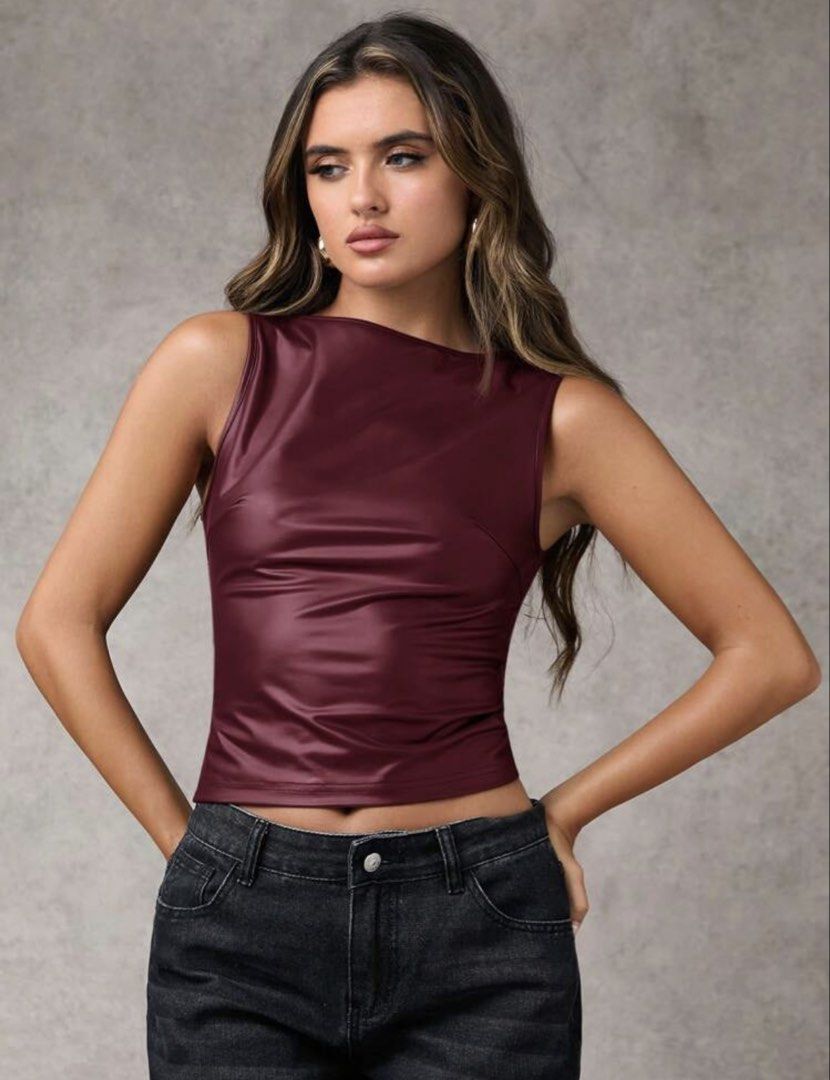 Latex Sleeveless Top (Category: Sleeveless) located in Manila. Submitted by zyaia_ (Listing ID 1469664832, Image 1). Description: never been worn.