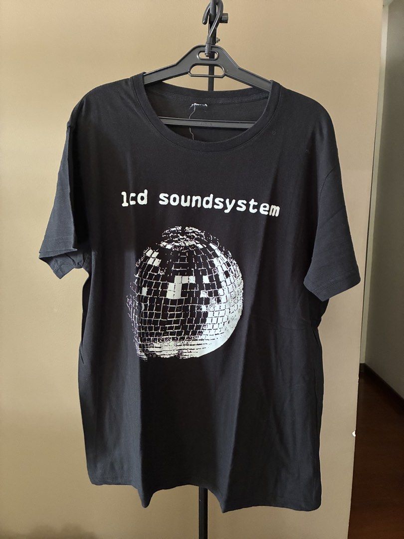 LCD Soundsystem Black T-Shirt (Category: Tshirts & Polo Shirts ) located in Quezon City. Submitted by 003___ (Listing ID 1469610880, Image 1). Description: 22x27 inches Fits M-L.