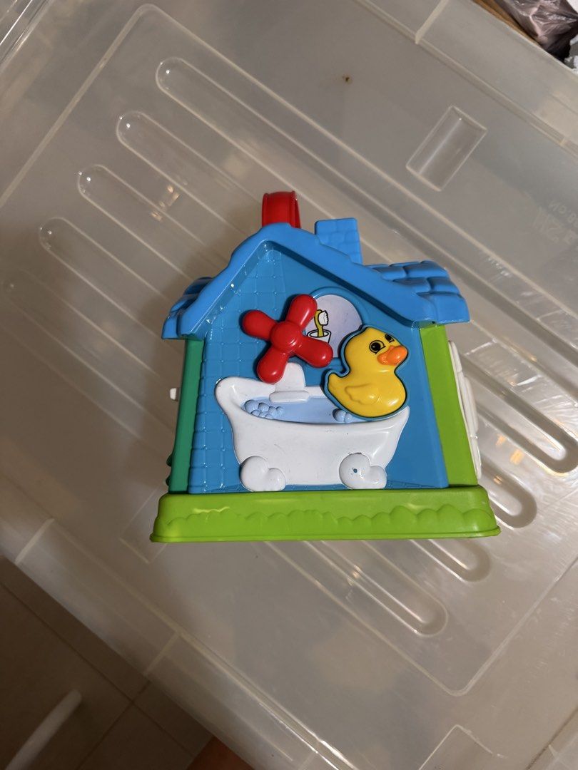 LeapFrog Learning Home interactive toy house (Category: Educational & Learning Toys) located in Manila. Submitted by chicmom.of.3 (Listing ID 1469711684, Image 3). Description: - Multi-sided LeapFrog interactive play house with different themed rooms - Includes living room with reading nook, bathroom with rubber duck, and kitchen with fridge and clock details - Built-in sound features with a front power button and sound toggle switch - Easy-to-ca