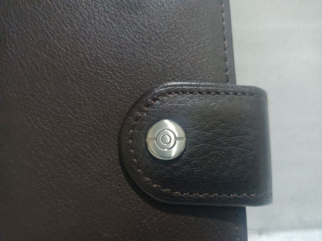 Leather Pokemon Center Wallet (Category: Wallets & Card Holders) located in Davao. Submitted by zeek_key_collectibles (Listing ID 1469671945, Image 3). Description: please note that etiketa has been removed. From Japan Exclusive.