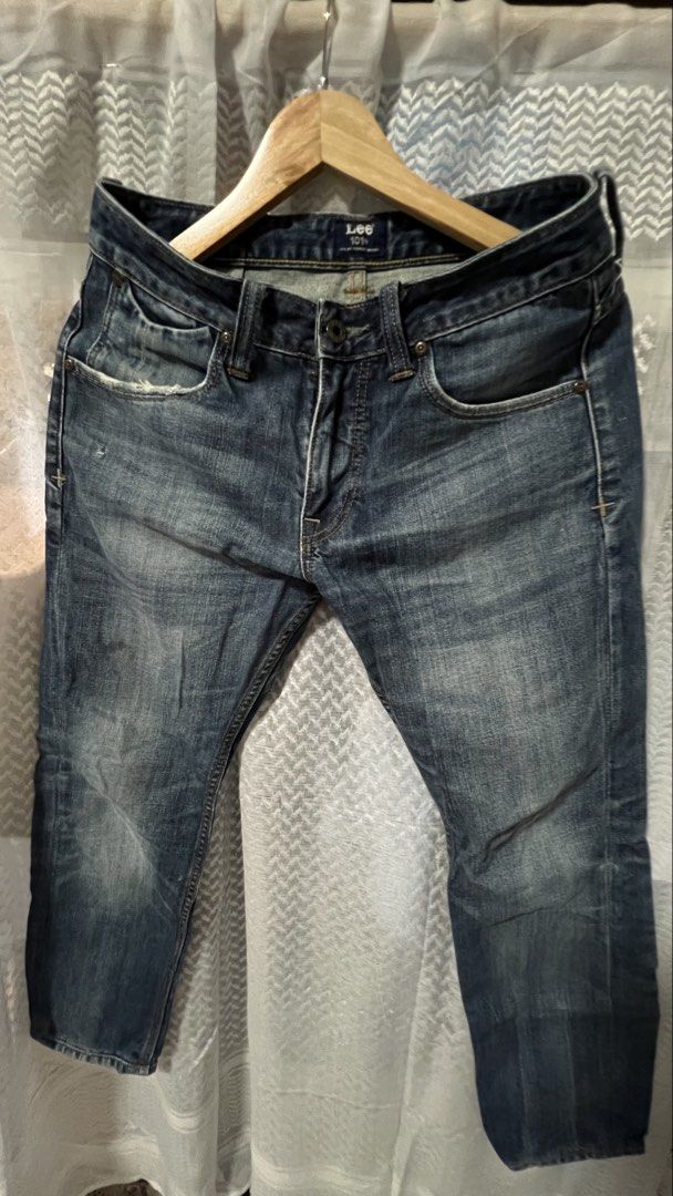 Lee 101+ Distressed Denim Jeans Dark Wash (Category: Jeans) located in Pasig City. Submitted by morilove (Listing ID 1469589095, Image 1). Description: - Brand/Model: Lee 101+ dark wash denim jeans - Fit: Slim fit with a rugged, worn-in aesthetic - Details: Heavy fading, whiskering, and distressed pocket edges - Hardware: Button fly closure with branded hardware - Classic Features: Lee leather back patch and iconic lazy S back pocket stitching - 