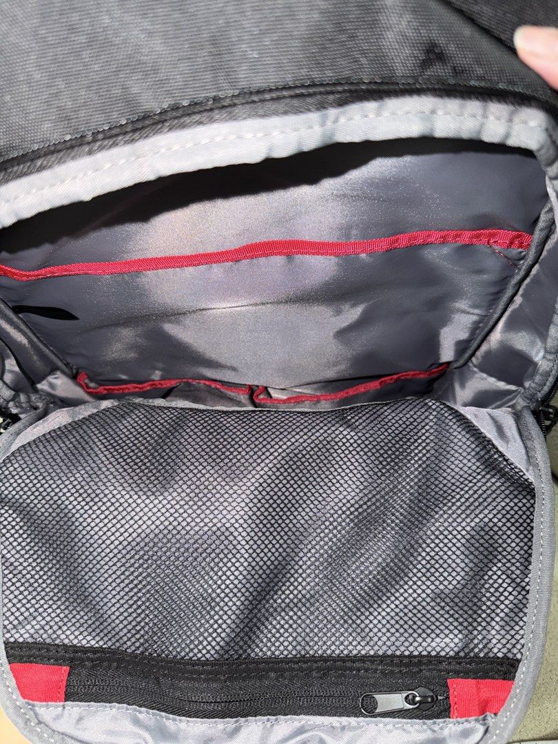 Lenovo ThinkPad Black Laptop Backpack (Category: Backpacks) located in Pasig City. Submitted by kzbcm2 (Listing ID 1469620215, Image 3). Description: - Authentic Lenovo ThinkPad black laptop backpack - Multiple zipped compartments and inner mesh pockets for easy organization - Padded back panel and shoulder straps for all-day comfort - Heavy-duty molded top handle for extra durability - Stylish signature red stitching and zipper pulls - Clean int