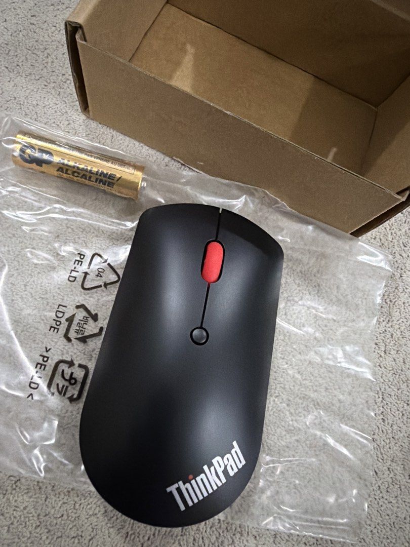 Lenovo ThinkPad Bluetooth Silent Mouse (Category: Mouse & Mousepads) located in Pasig City. Submitted by kzbcm2 (Listing ID 1469620722, Image 1). Description: - Brand: Lenovo ThinkPad - Color: Black - Connectivity: Wireless Bluetooth - Feature: Quiet clicking mechanism (Zero noise pollution) - Condition: Like new with original cardboard box and plastic packaging - Inclusions: Free fresh alkaline battery - Ideal for: Office work, online classes, a