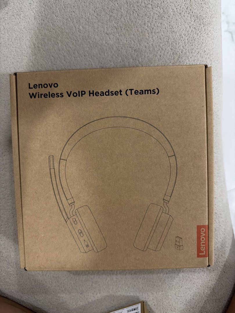 Lenovo Wireless VoIP Headset Teams (Category: Headphones & Headsets) located in Pasig City. Submitted by kzbcm2 (Listing ID 1469620537, Image 2). Description: - Brand: Lenovo - Color: Black, Over-ear design - Condition: Brand new and unused - Compatibility: Certified for Microsoft Teams - Features: Built-in microphone boom arm, ideal for remote work and virtual meetings - Inclusions: Original box, wireless USB receiver, and branded drawstring sto