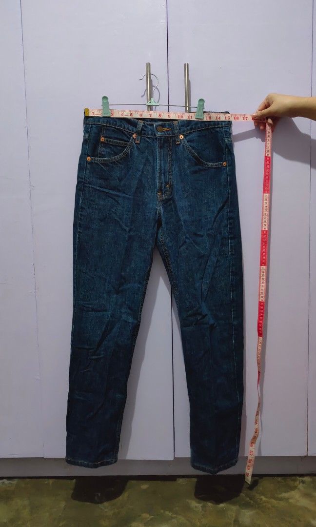 Levi's 504 Dark Wash Denim Jeans (Category: Jeans) located in Bacolor. Submitted by annjjjjj (Listing ID 1469649376, Image 3). Description: - Brand/Model: Levi's 504 Regular Straight Fit - Color/Wash: Dark blue wash with nice fading - Size: W32 L32 (leather patch on back waistband) - Details: Classic five-pocket styling, orange contrast stitching, and signature red tab - Condition: Clean, pre-loved, and ready to wear.
