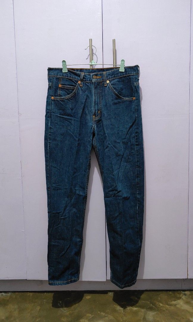 Levi's 504 Dark Wash Denim Jeans (Category: Jeans) located in Bacolor. Submitted by annjjjjj (Listing ID 1469649376, Image 2). Description: - Brand/Model: Levi's 504 Regular Straight Fit - Color/Wash: Dark blue wash with nice fading - Size: W32 L32 (leather patch on back waistband) - Details: Classic five-pocket styling, orange contrast stitching, and signature red tab - Condition: Clean, pre-loved, and ready to wear.