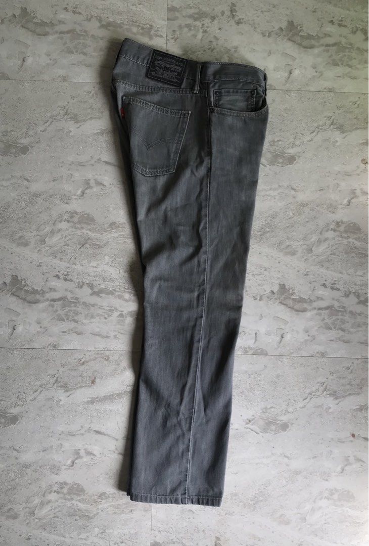 Levi's Grey Jeans Size W32 L32 (Category: Jeans) located in Banga. Submitted by jorguarino (Listing ID 1469620662, Image 2). Description: - Brand: Levi's - Color: Grey - Size: W32 L32 - Material: 100% cotton denim - Fit: Comfortable straight fit - Features: Classic five-pocket design, button fly, and back leather patch - Style: Versatile daily wear, easy to match with t-shirts and hoodies.
