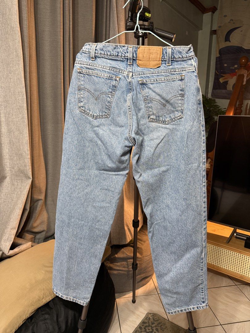 Levi's Light Wash Denim Jeans (Category: Jeans) located in Manila. Submitted by gochaseme (Listing ID 1469661521, Image 3). Description: - Brand: Levi's - Wash: Light / medium blue - Fit: Straight leg - Closure: Classic button fly with metal rivet hardware - Details: Traditional 5-pocket layout, leather patch on back waistband, slight distressing on bottom hem - Condition: Excellent, great everyday casual staple - Shipping or meetups available ac
