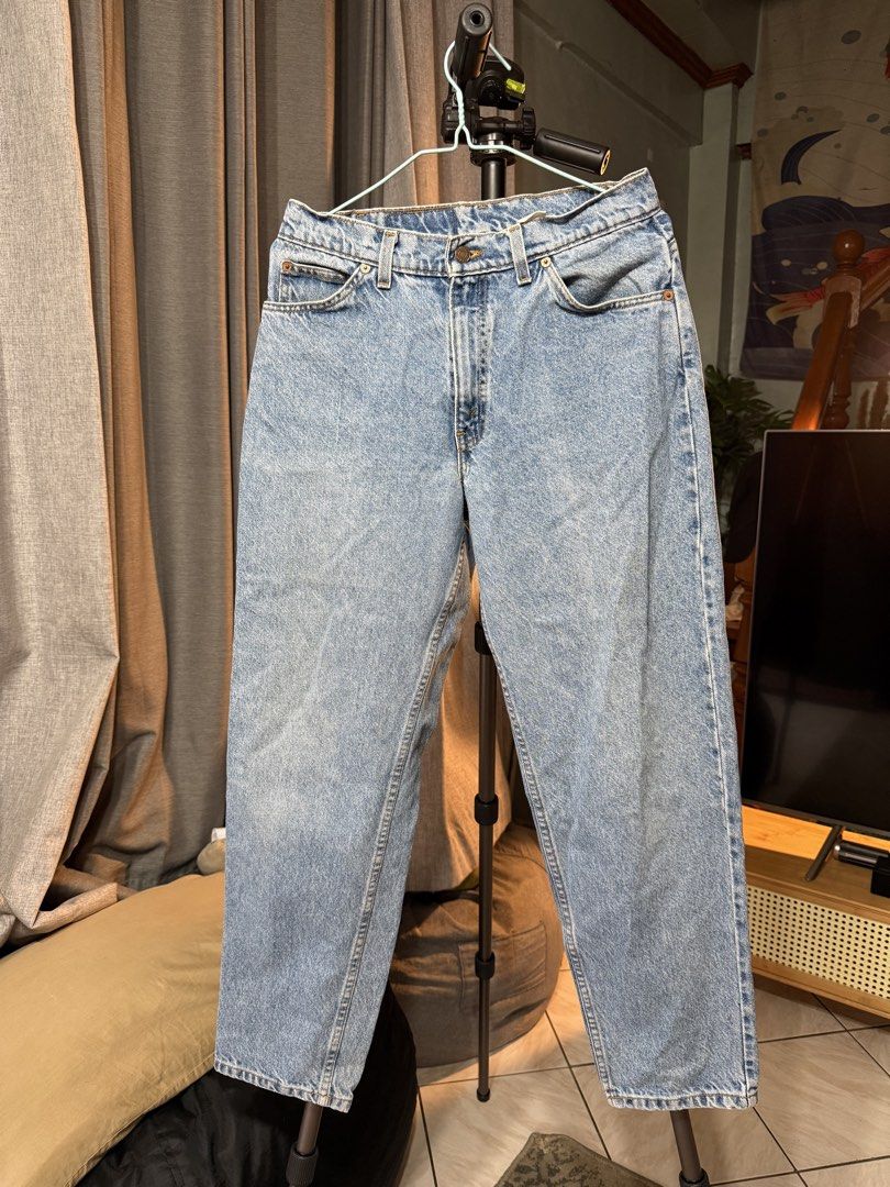 Levi's Light Wash Denim Jeans (Category: Jeans) located in Manila. Submitted by gochaseme (Listing ID 1469661521, Image 1). Description: - Brand: Levi's - Wash: Light / medium blue - Fit: Straight leg - Closure: Classic button fly with metal rivet hardware - Details: Traditional 5-pocket layout, leather patch on back waistband, slight distressing on bottom hem - Condition: Excellent, great everyday casual staple - Shipping or meetups available ac