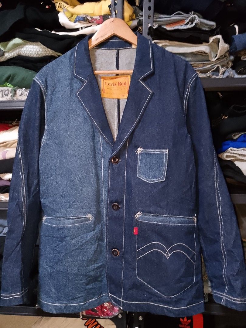Levi's Red Denim Blazer Size S (Category: Coats, Jackets and Outerwear) located in Manila. Submitted by mjthrifted_second (Listing ID 1469653014, Image 1). Description: Levi's Red denim jacket styled like a blazer. Dimension 22/28Dark wash with contrast white stitching throughout. Size S tag at the inner collar. Multiple front pockets including arcuate stitching on the lower right pocket. Three button closure down the front. Extra buttons attache