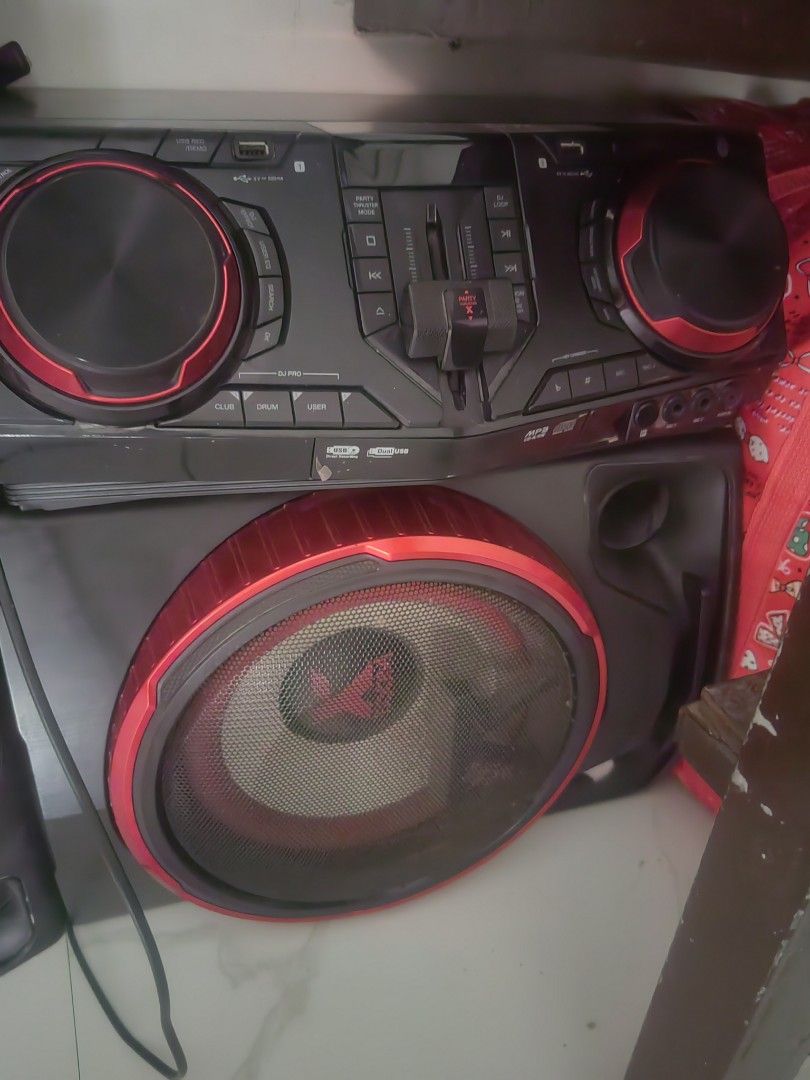 LG XBOOM Party Speaker System DJ Console (Category: Soundbars, Speakers & Amplifiers) located in Makati City. Submitted by donald1983 (Listing ID 1469578110, Image 3). Description: - Powerful LG sound system with heavy bass and DJ controls - Big dual tower speakers with a separate sub unit (red accent rings) - Features dual USB ports and party lighting - Tested and 100% fully operational - Delivers massive sound, perfect for gatherings and partie