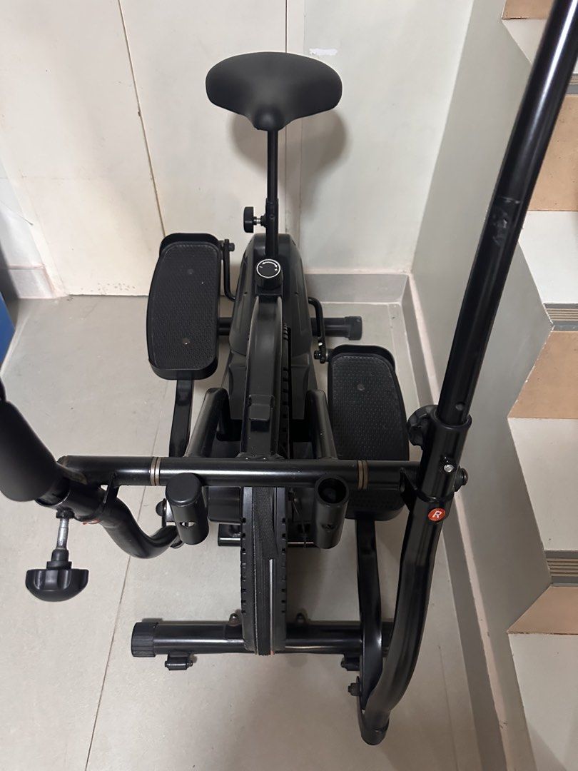LifeGear Elliptical Bike Exercise Machine (Category: Cardio & Fitness Machines) located in Marikina City. Submitted by rctoby00 (Listing ID 1469590741, Image 2). Description: With obvious signs of usage. With removed rubbers, but still working. Just want to clear the space. - Brand: LifeGear - Frame: Sturdy black steel - Comfort: Cushioned seat and textured foot pedals - Resistance: Easily adjustable via the main body knob - Handlebars: Dual movi