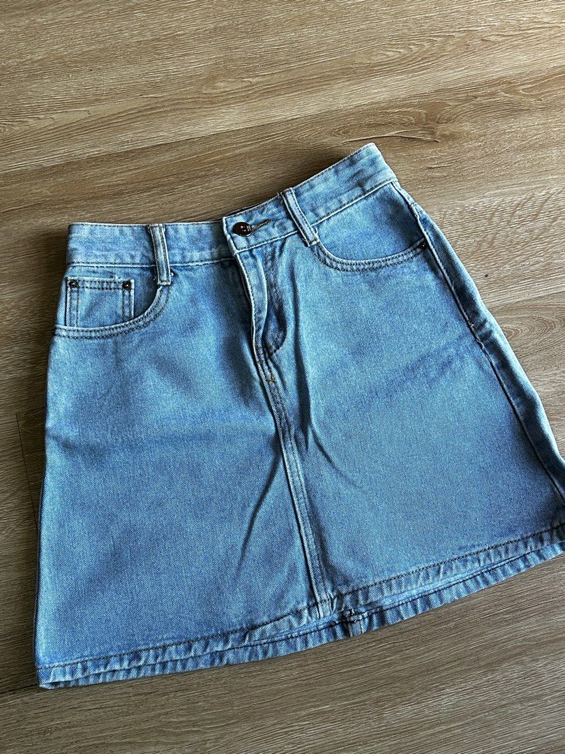 Light Blue Denim Mini Skirt (Category: Skirts) located in Taguig. Submitted by my.serendipithrift (Listing ID 1469642739, Image 3). Description: Size: W23-25 L14 Light blue denim color Makapal tela With adjustment stitches at the back (malinis tahi) Washed and ready to wear.