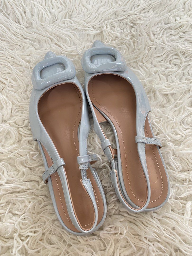 Light Blue Patent Slingback Block Heels with Square Buckle (Category: Heels) located in Tabaco. Submitted by camila_p (Listing ID 1469603884, Image 3). Description: - Color & Material: Light blue patent with nude inner lining - Design: Pointed toe with a chic chunky square buckle - Heel: Comfortable low block heel for all-day walking - Fit: Elastic slingback strap for easy wear - Condition: Worn once only for 30 mins in a party. very clean soles 
