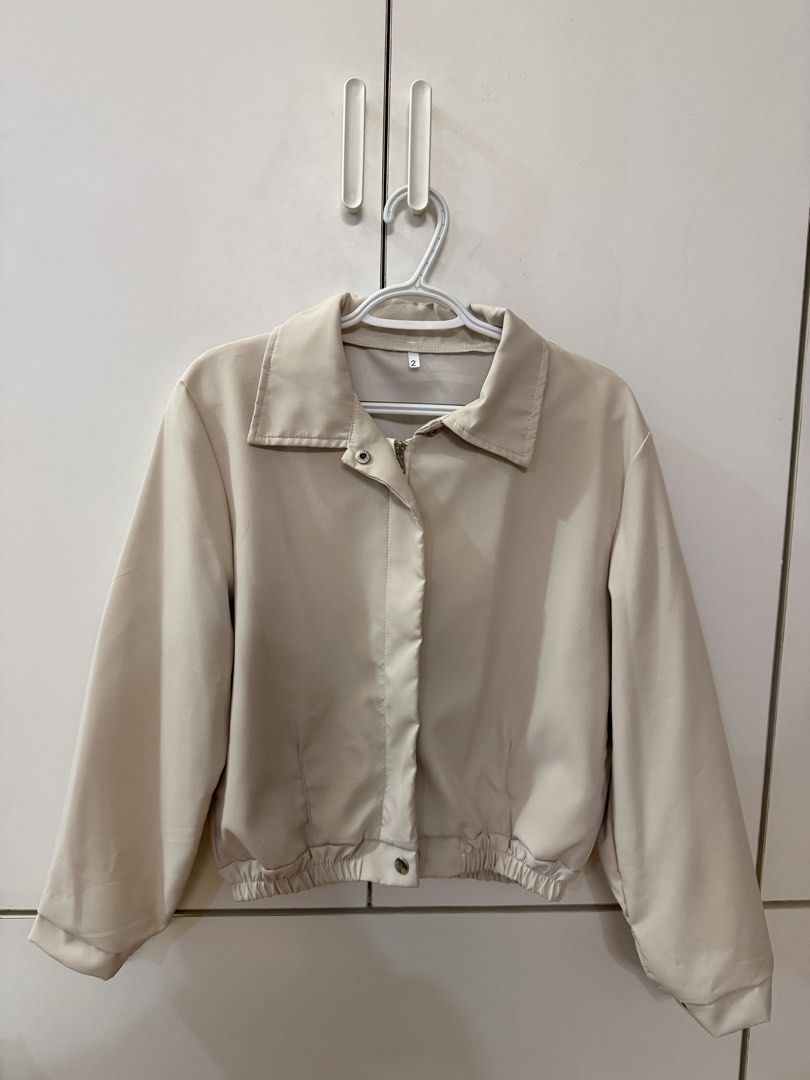 Light Khaki Blouson Jacket (Category: Coats, Jackets and Outerwear) located in Quezon City. Submitted by hazpreloved (Listing ID 1469707770, Image 3). Description: Bought in China Unlined Free size, fits S-M Listing & Actual photos posted, please manage quality expectations Tags: h&m, cotton on, zara, mango, love bonito.