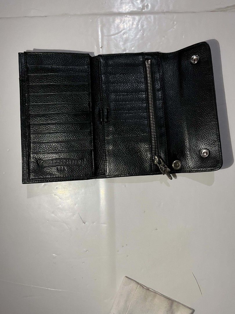 Long wallet (Category: Wallets & Card holders) located in Zamboanga. Submitted by 2ndabubazir (Listing ID 1469712979, Image 2). Description: - A long wallet in black grained leather - Multiple interior card slots and zippered coin pocket - grommet for wallet chain attachment - Stamped interior branding - Condition: Excellent Well-maintained - Ships securely from the Philippines - DM for more details or offers.