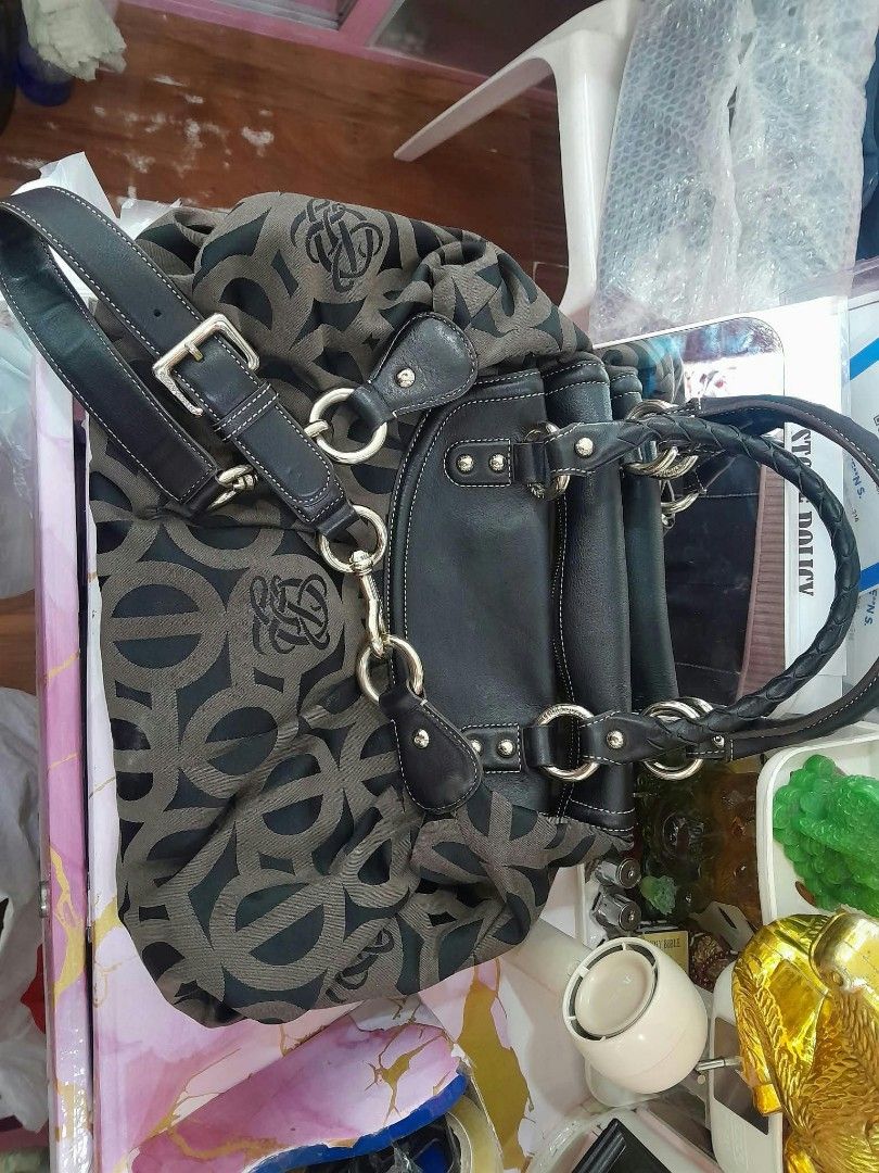 Louis Quatorze Monogram Handbag Black Brown (Category: Luxury Bags & Wallets) located in Manila. Submitted by royalwhale_636cf8 (Listing ID 1469594603, Image 3). Description: - Brand: Louis Quatorze - Design: Black and brown monogram fabric with black leather trim and silver-tone hardware - Handles & Strap: Stylish braided top handles plus a removable/adjustable shoulder strap - Closure & Interior: Secure top zipper closure with a branded brown l