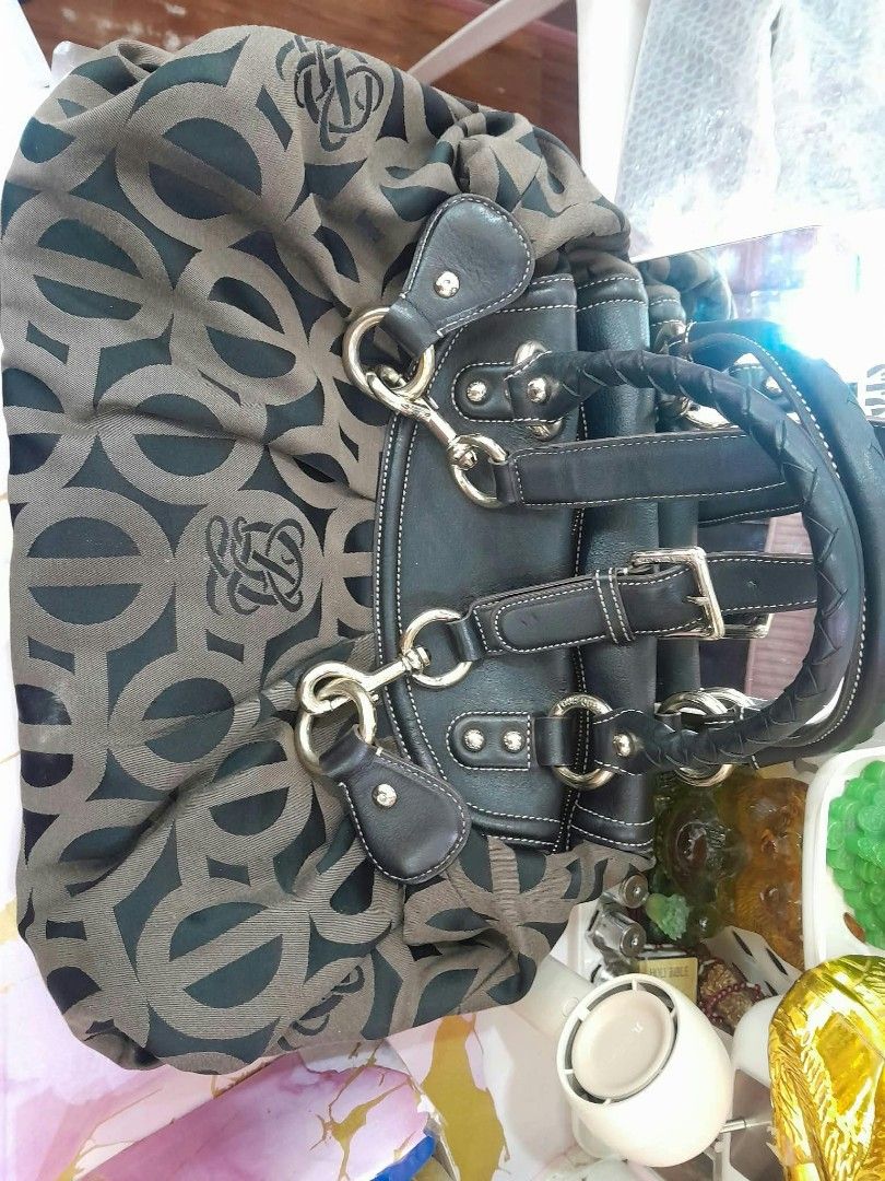 Louis Quatorze Monogram Handbag Black Brown (Category: Luxury Bags & Wallets) located in Manila. Submitted by royalwhale_636cf8 (Listing ID 1469594603, Image 1). Description: - Brand: Louis Quatorze - Design: Black and brown monogram fabric with black leather trim and silver-tone hardware - Handles & Strap: Stylish braided top handles plus a removable/adjustable shoulder strap - Closure & Interior: Secure top zipper closure with a branded brown l