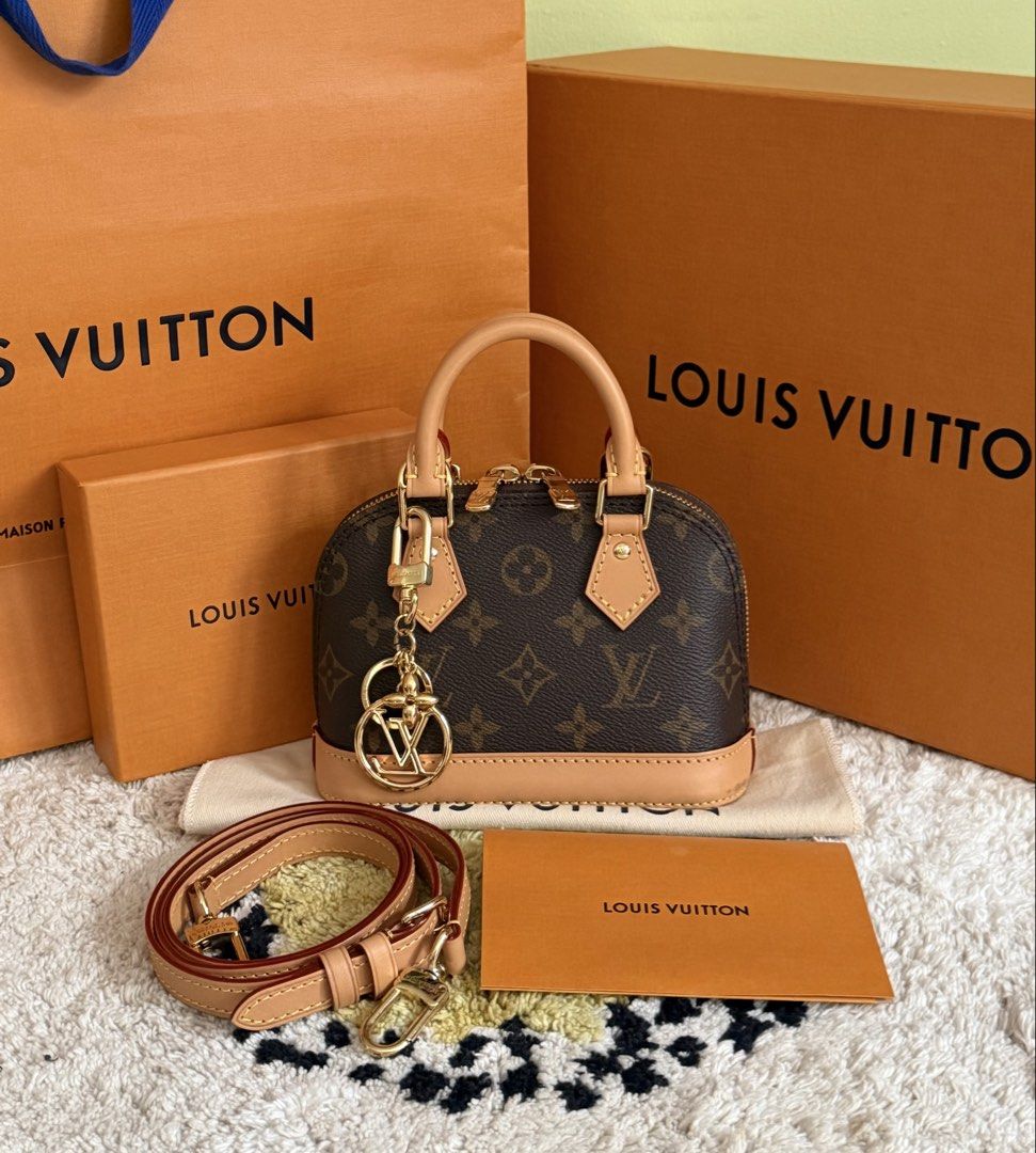 Louis Vuitton Alma Nano (Category: Luxury Bags & Wallets) located in Manila. Submitted by rellamaaim07341 (Listing ID 1469710489, Image 1). Description: Alma Nano Like New Complete Inclusion with Receipt With free Chain Can Fit Promax No Haggling‼️.
