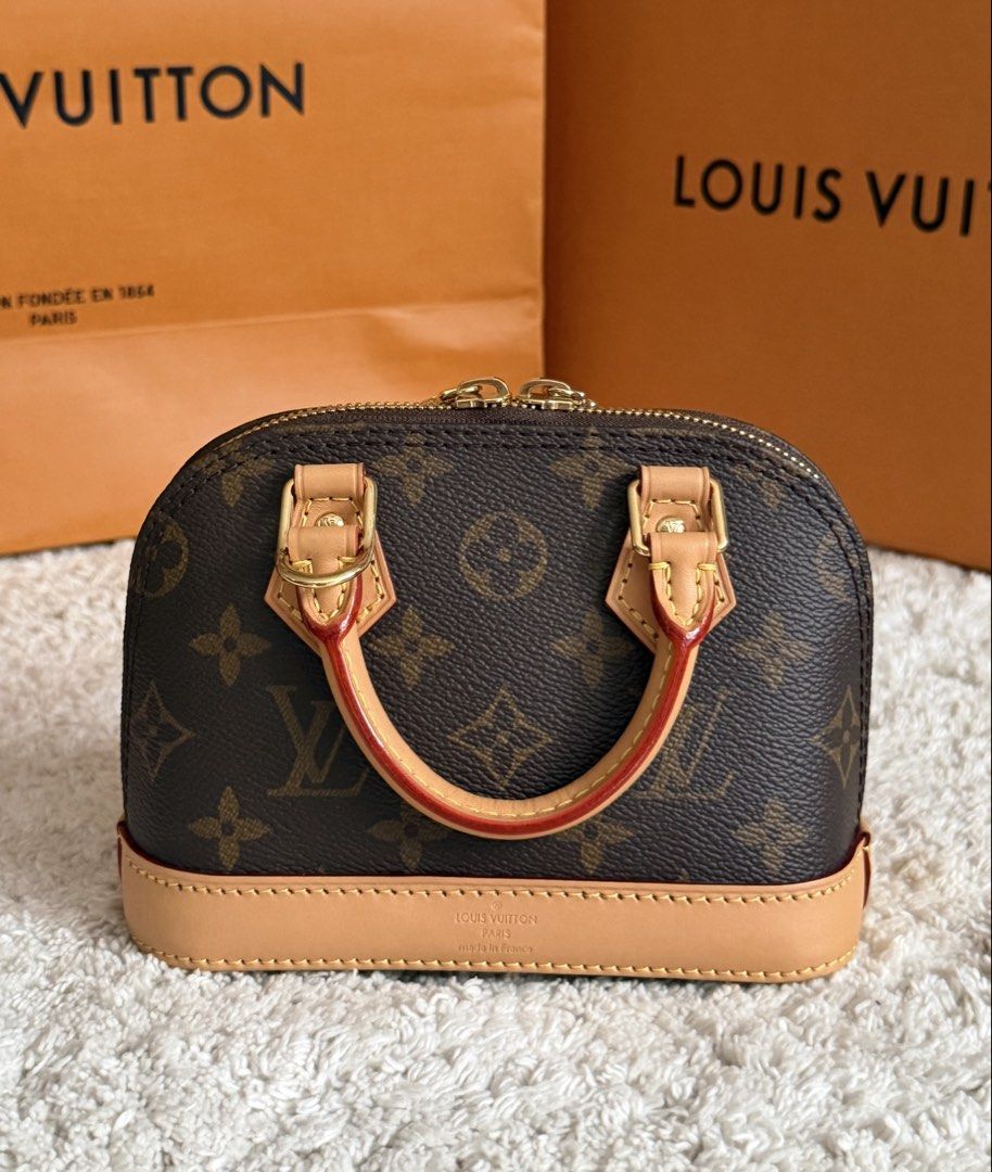 Louis Vuitton Alma Nano (Category: Luxury Bags & Wallets) located in Manila. Submitted by rellamaaim07341 (Listing ID 1469710489, Image 2). Description: Alma Nano Like New Complete Inclusion with Receipt With free Chain Can Fit Promax No Haggling‼️.