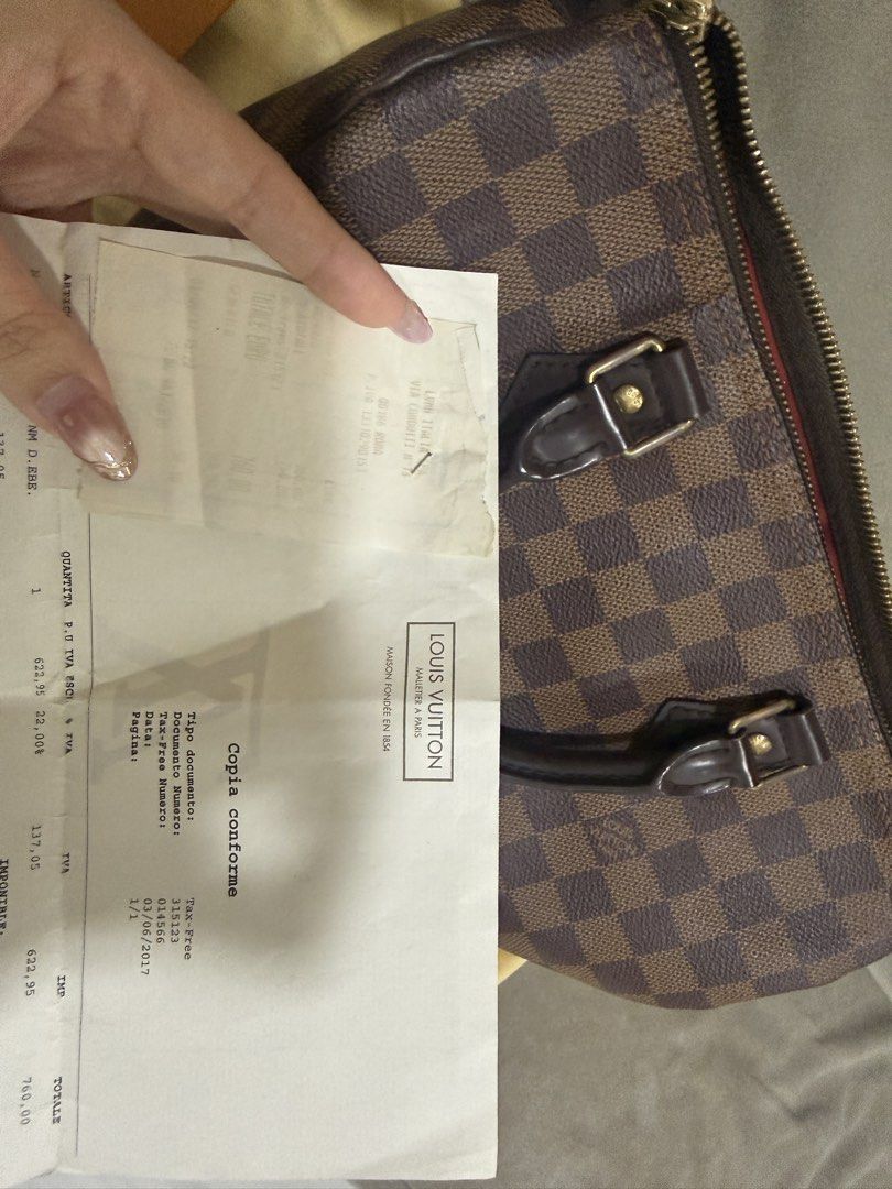 Louis Vuitton Damier Ebene Handbag (Category: Looking For) located in Caloocan City. Submitted by kimmndza_176 (Listing ID 1469662861, Image 1). Description: - Authentic Louis Vuitton Damier Ebene handbag in classic brown checkered canvas - Dual dark brown leather handles and elegant gold-tone hardware - Secure top zip closure with a structured, timeless shape - Includes original store receipt from Rome dated June 2017 - Comes with dust bag as se